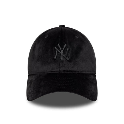 New York Yankees MLB Velour Black New Era 9TWENTY Bow Back Adjustable Cap, front view showing a black NY logo in raised embroidery on the structured velour crown and a matching curved visor with stitching details.