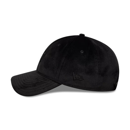 New York Yankees MLB Velour Black New Era 9TWENTY Bow Back Adjustable Cap, side view showing the embroidered New Era flag logo on the left side, with a soft black velour texture and unstructured crown.