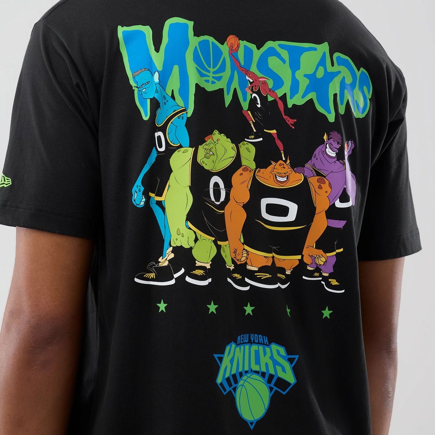 The model is wearing this Space Jam 2 X NBA New York Knicks T-Shirt in black. 4