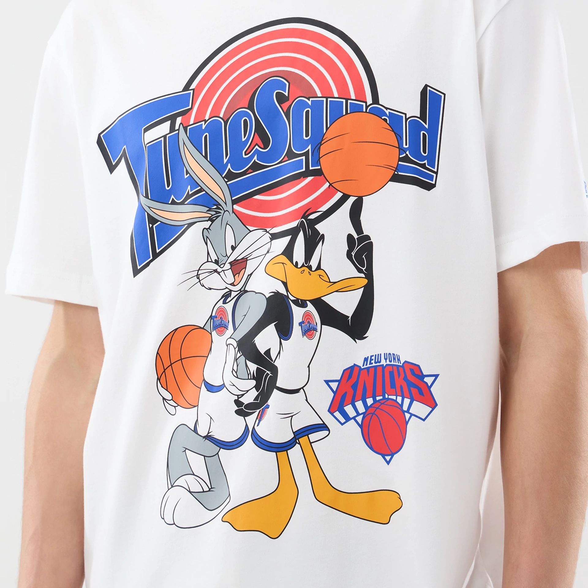 The model is wearing this Space Jam 2 X NBA New York Knicks T-Shirt in white. 5