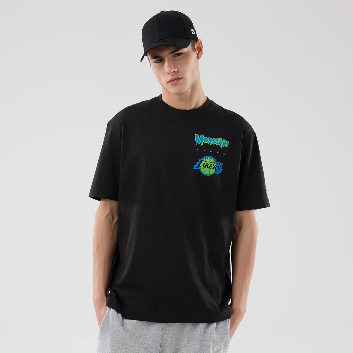 The model is wearing this Space Jam 2 X NBA LA Lakers T-Shirt in black. 1