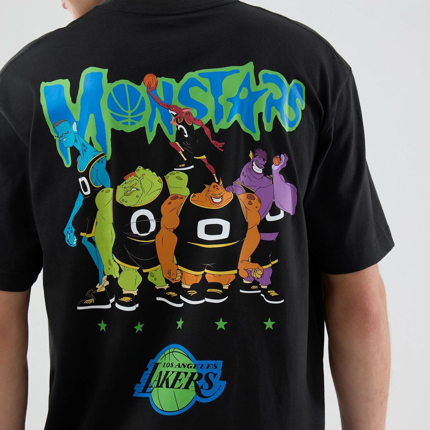 The model is wearing this Space Jam 2 X NBA LA Lakers T-Shirt in black. 4