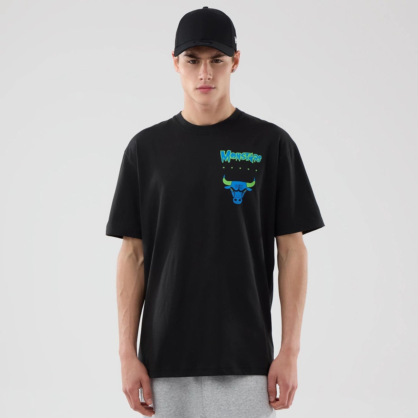 The model is wearing this Space Jam 2 X NBA Chicago Bulls T-Shirt in black. 1