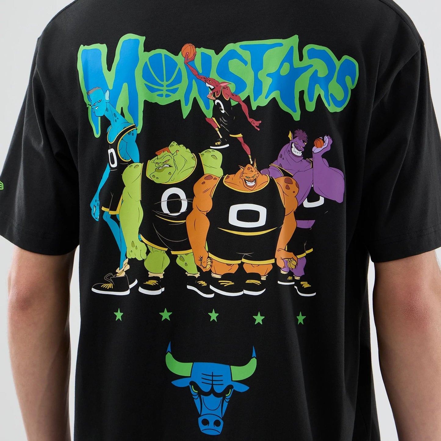 The model is wearing this Space Jam 2 X NBA Chicago Bulls T-Shirt in black. 4