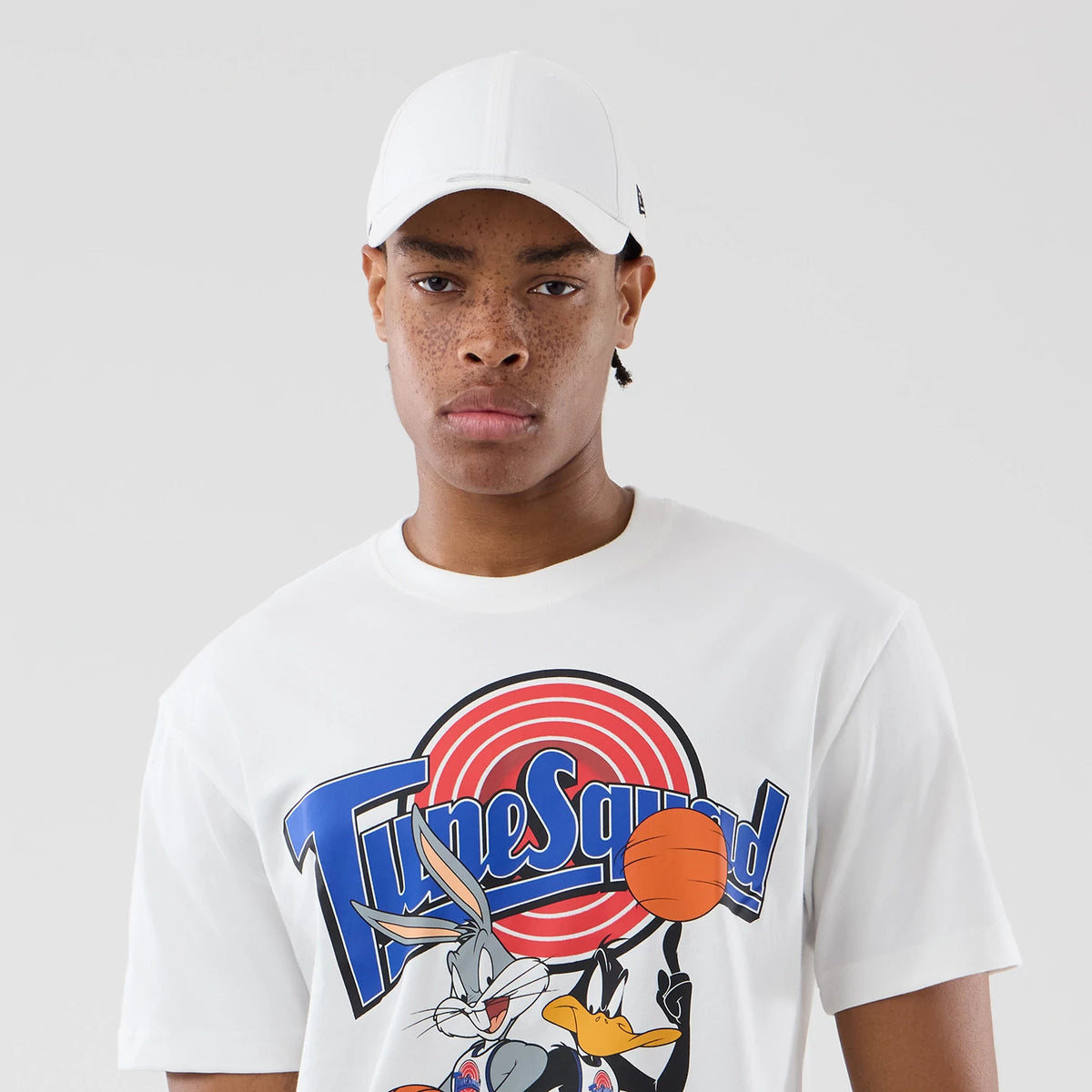 The model is wearing this Space Jam 2 X NBA Chicago Bulls T-Shirt in white. 6