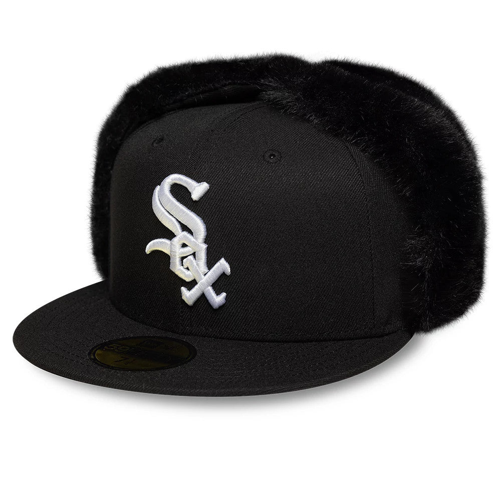 Chicago White Sox MLB World Series Black Dogear New Era 59FIFTY Fitted Cap, three-quarter view showing the raised white embroidered Sox logo on the front panel, black faux fur dogears, and a gold 59FIFTY size sticker on the flat visor.