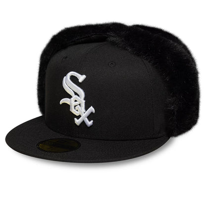 Chicago White Sox MLB World Series Black Dogear New Era 59FIFTY Fitted Cap, three-quarter view showing the raised white embroidered Sox logo on the front panel, black faux fur dogears, and a gold 59FIFTY size sticker on the flat visor.