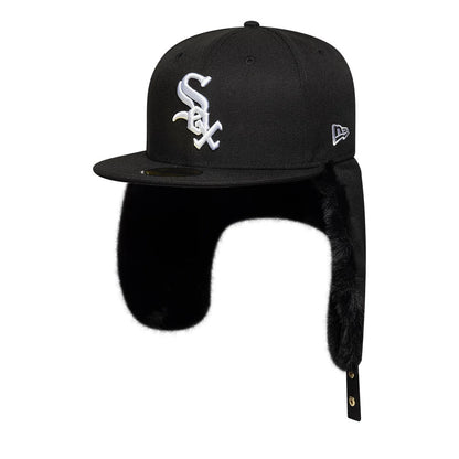 Chicago White Sox MLB World Series Black Dogear New Era 59FIFTY Fitted Cap, three-quarter view showing raised white Sox logo embroidery on the front panel, a flat black visor with a gold 59FIFTY size sticker, and extended black furry dogears.