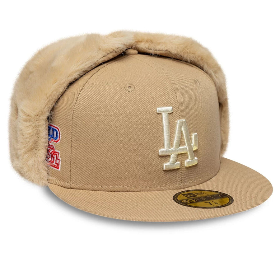 Pictured is this MLB World Series LA Dodgers Dogear 59FIFTY Fitted cap in light beige. 1