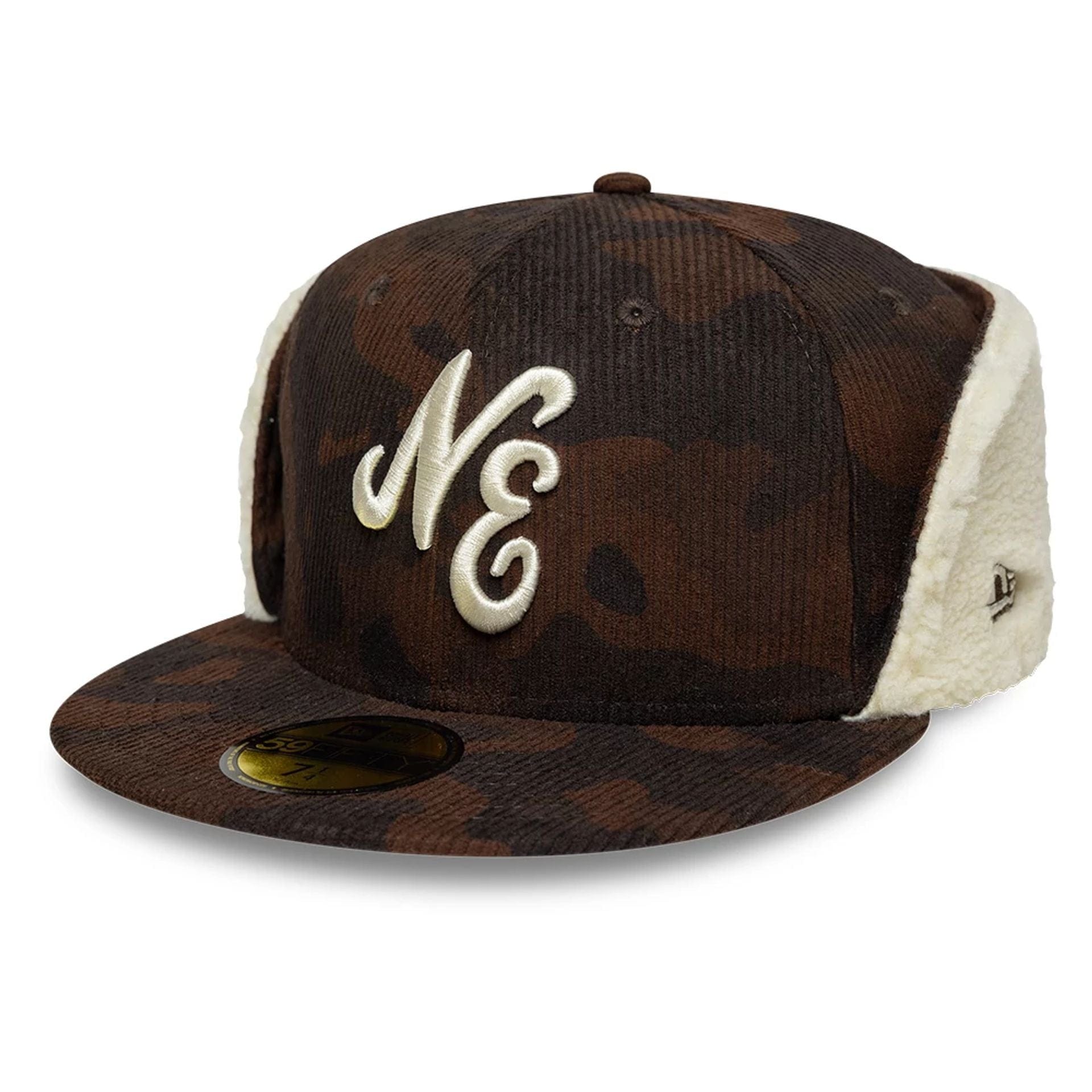 Pictured is this New Era Cord Downflap 59FIFTY Fitted cap in dark brown. 1