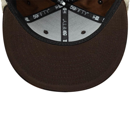 Pictured is this New Era Cord Downflap 59FIFTY Fitted cap in dark brown. 11