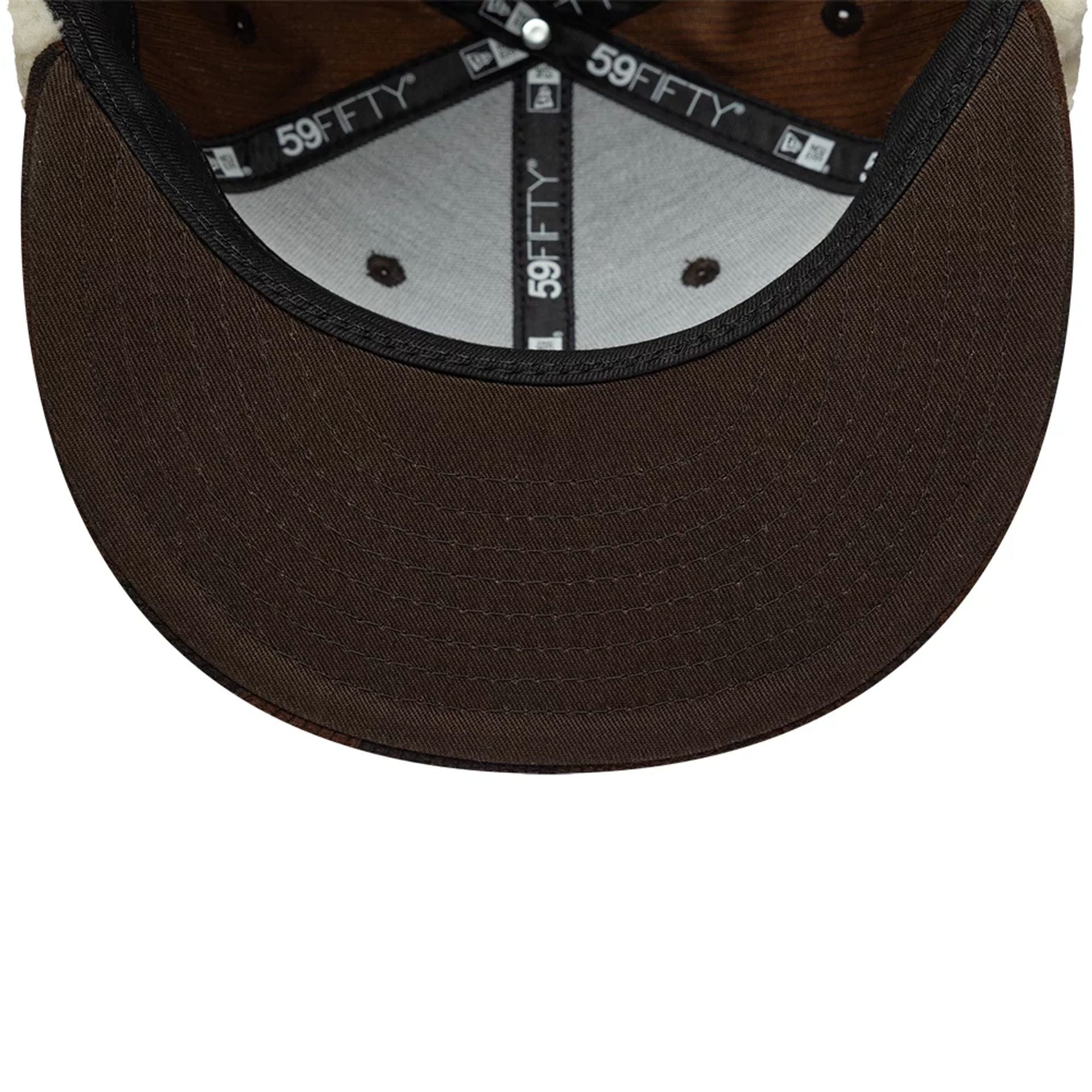 Pictured is this New Era Cord Downflap 59FIFTY Fitted cap in dark brown. 11