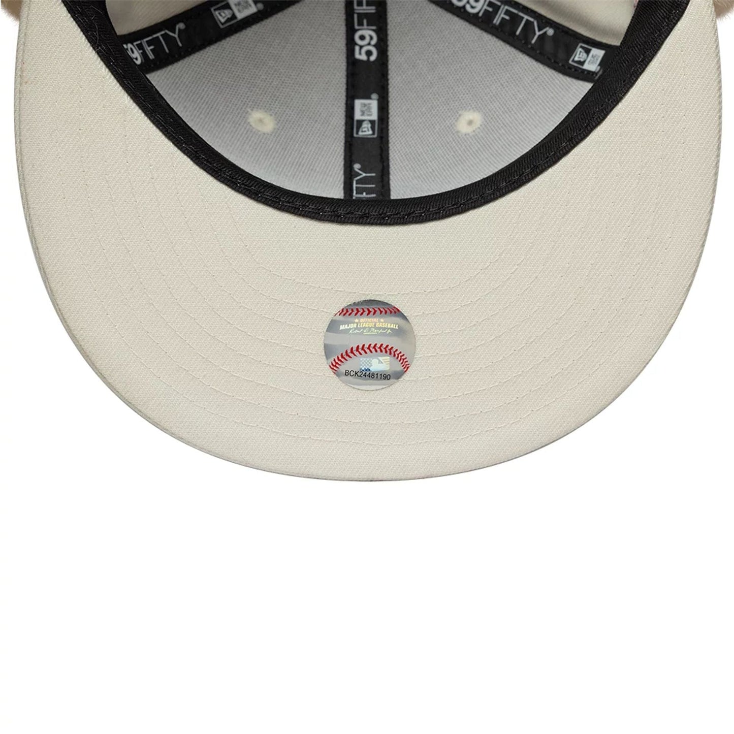 Pictured is this MLB World Series Oakland Athletics Dogear 59FIFTY Fitted cap in cream. 11
