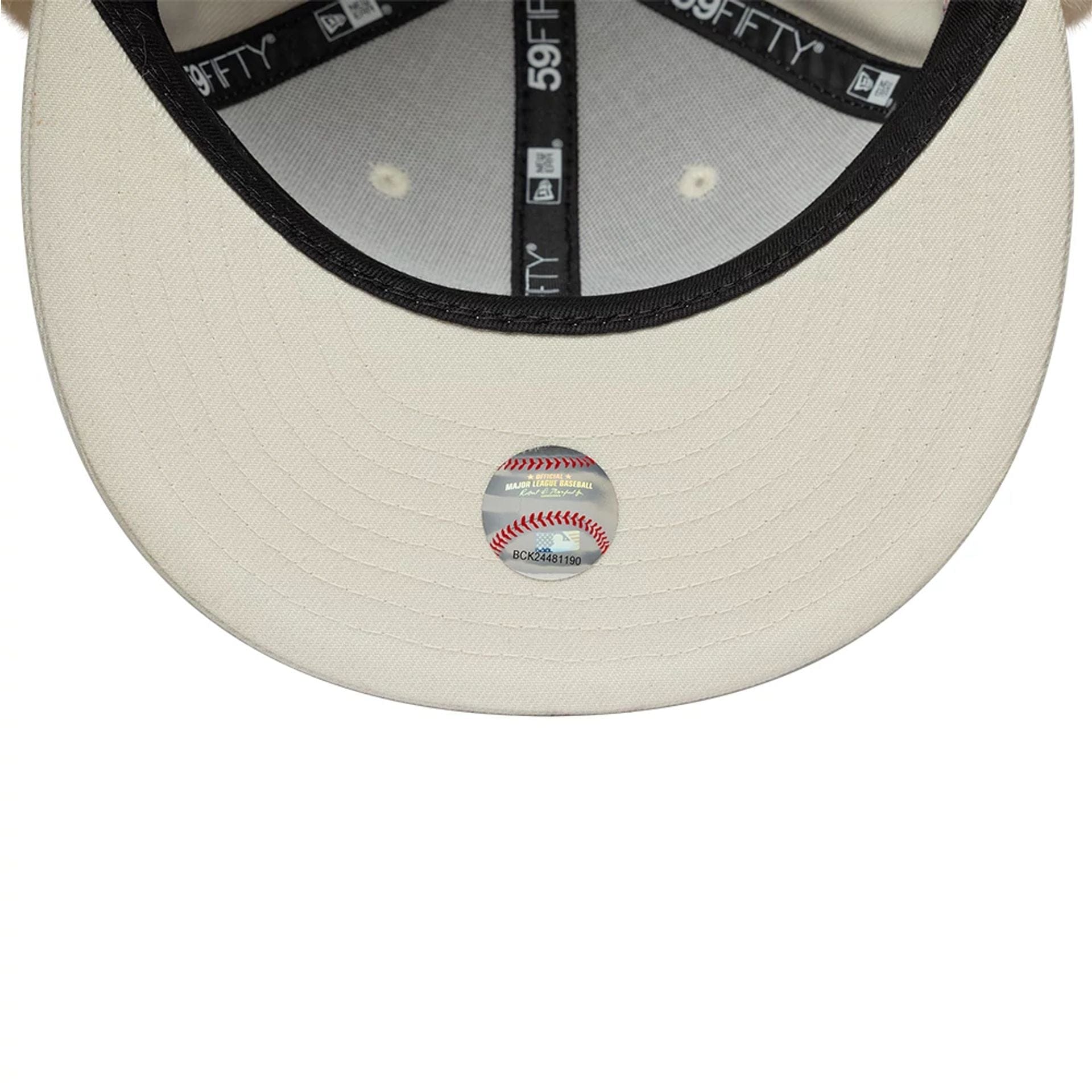 Pictured is this MLB World Series Oakland Athletics Dogear 59FIFTY Fitted cap in cream. 11
