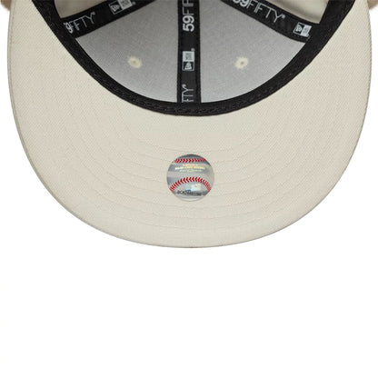 Pictured is this MLB World Series Oakland Athletics Dogear 59FIFTY Fitted cap in cream. 11