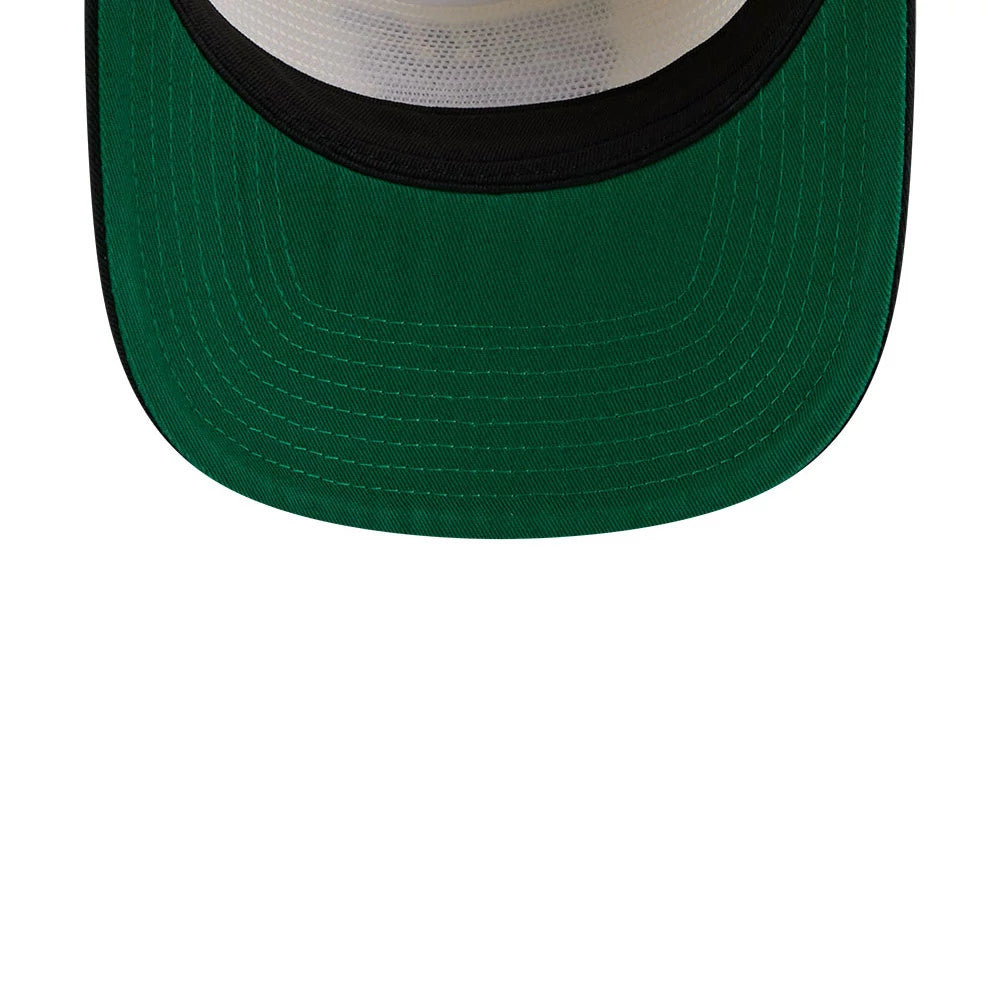 Chicago Bulls NBA 2 Tone Washed Cream New Era 19TWENTY Adjustable Cap, inside view showing the green undervisor and black interior band, highlighting the curved front visor and contrasting stitch lines.