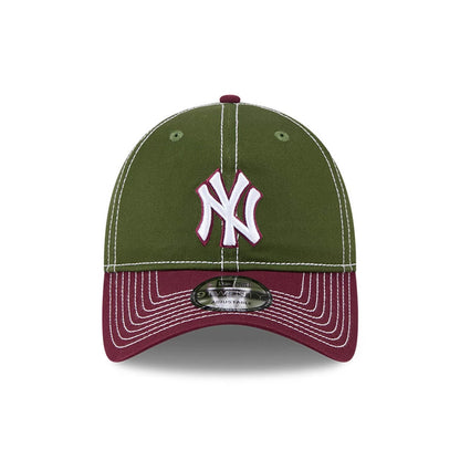 New York Yankees MLB 2Tone Dark Green New Era 9TWENTY Adjustable Cap, front view showing the raised white and maroon embroidered NY logo on the dark green crown with contrasting maroon visor and a 9TWENTY size sticker.