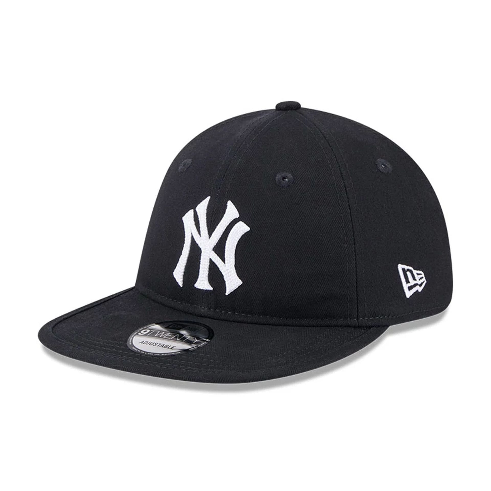 Pictured is this MLB Herringbone New York Yankees 9TWENTY cap in navy. 1