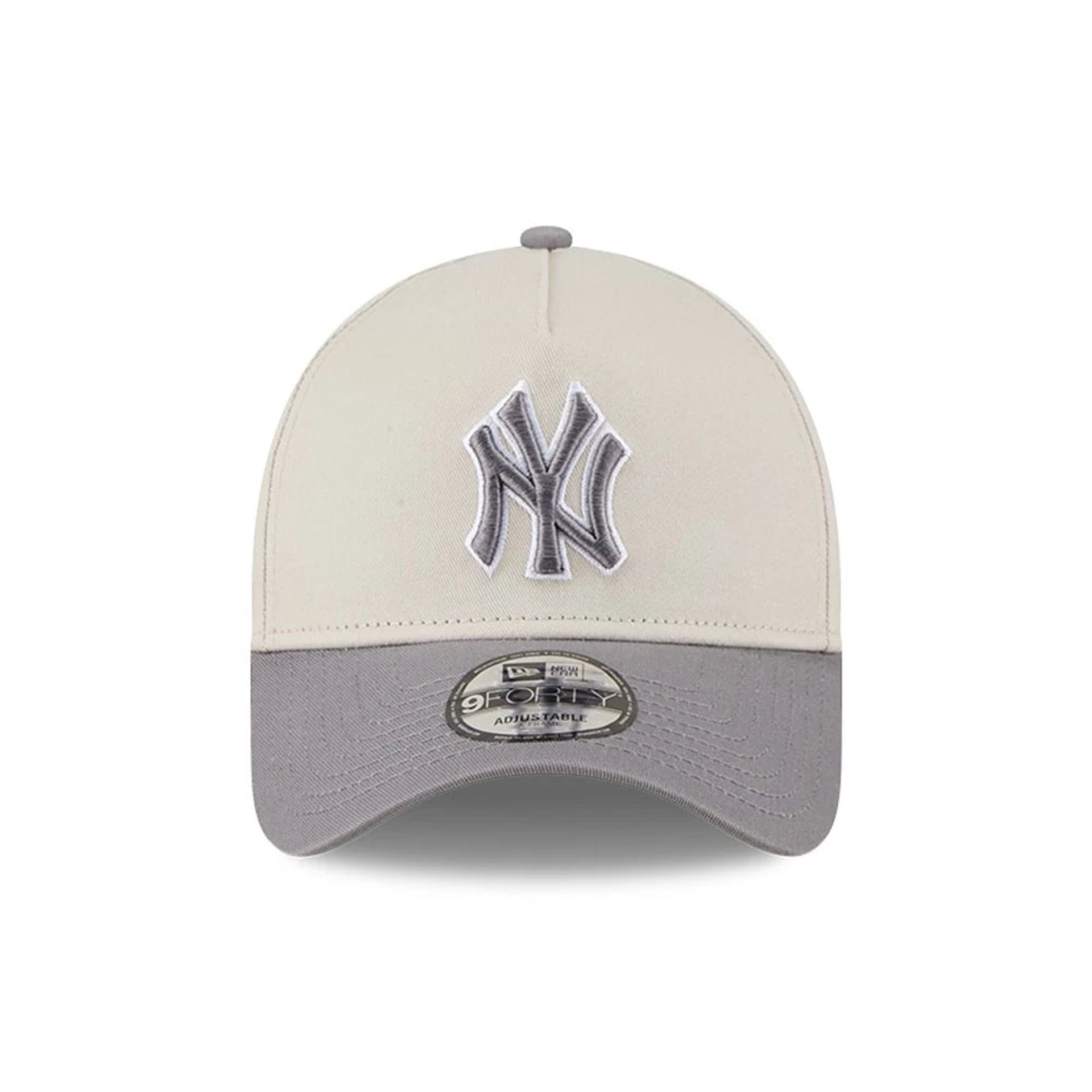 Pictured is this MLB Stone Storm New York Yankees 9FORTY A-Frame cap in light beige. 2