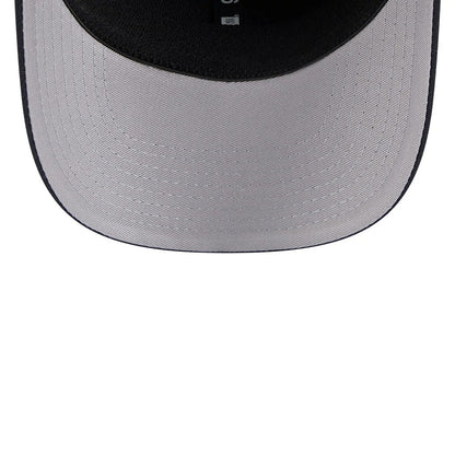 LA Dodgers MLB Navy New Era 9SEVENTY Stretch Snap Adjustable Cap, inside view showing the grey undervisor with detailed stitching and black interior taping, highlighting the adjustable snap closure on the structured navy crown.