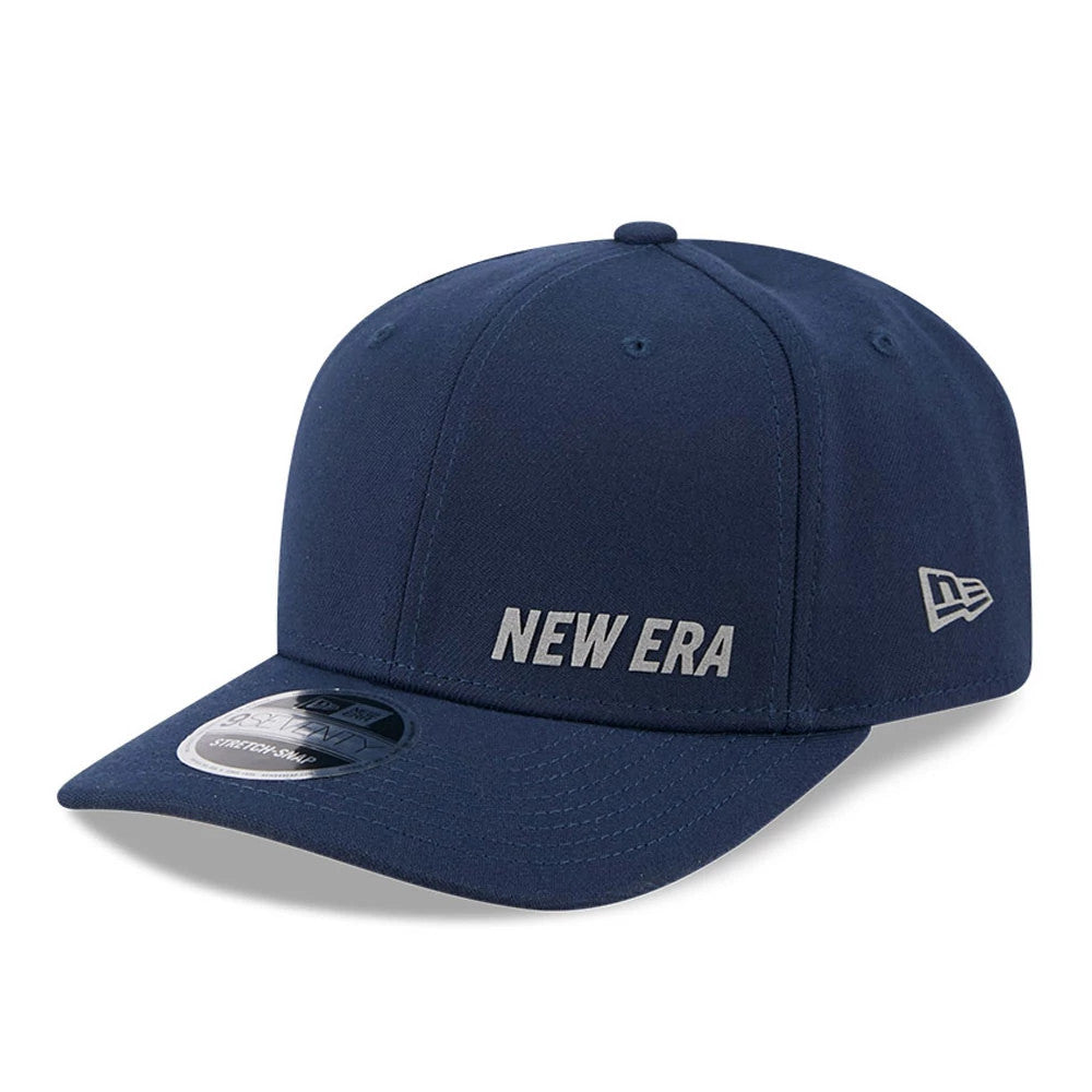Pictured is this New Era Flawless 9SEVENTY Stretch Snap cap in dark blue. 1