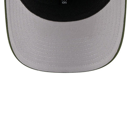 Pictured is this New Era Flawless 9SEVENTY Stretch Snap cap in dark green. 2