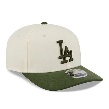 Pictured is this MLB Rifle Green LA Dodgers 9SEVENTY Stretch Snap cap in white. 4