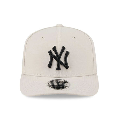 Pictured is this MLB New York Yankees 9SEVENTY Stretch Snap cap in light beige. 3