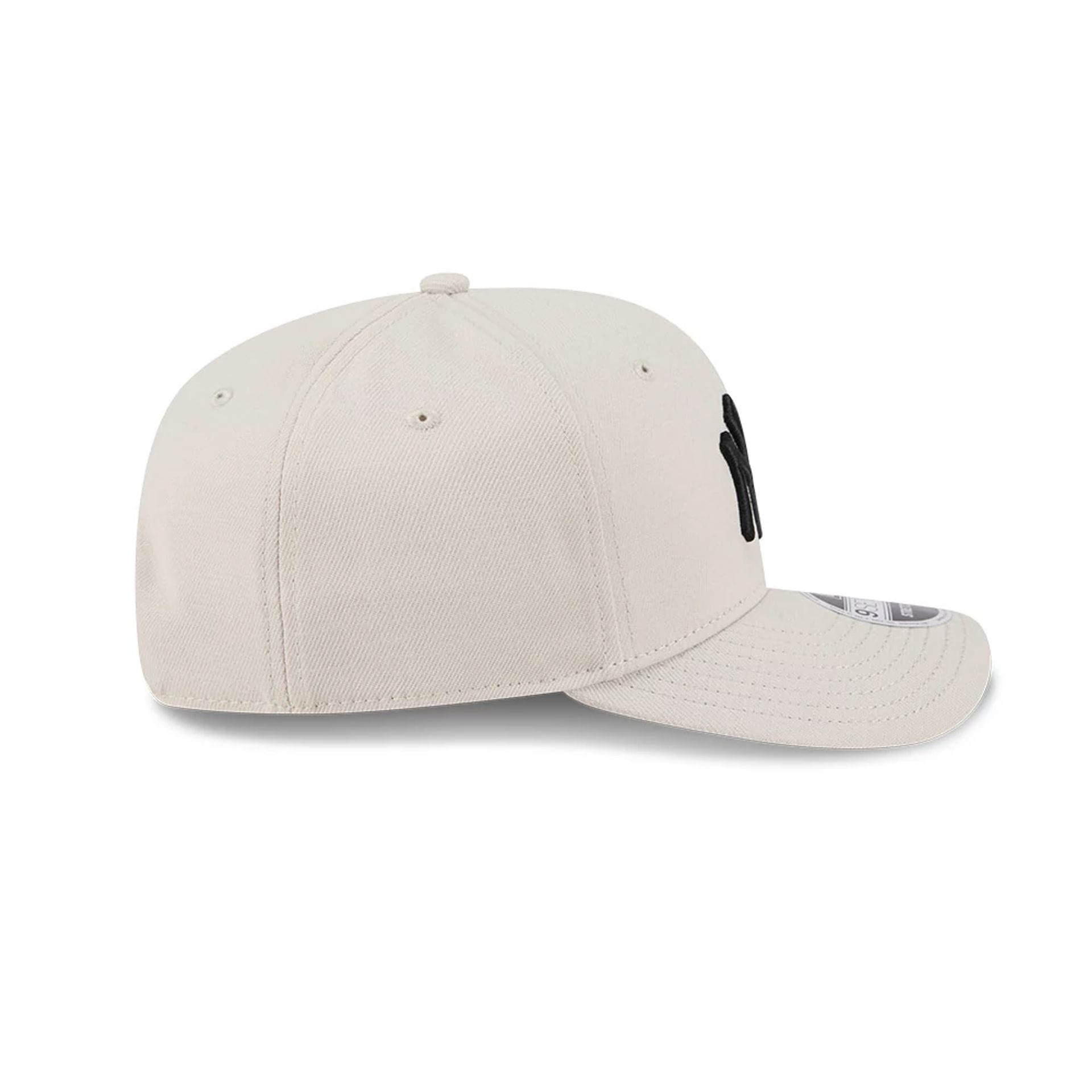 Pictured is this MLB New York Yankees 9SEVENTY Stretch Snap cap in light beige. 6