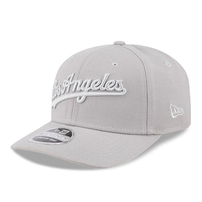 Pictured is this MLB Script LA Dodgers 9SEVENTY Stretch Snap cap in grey. 1