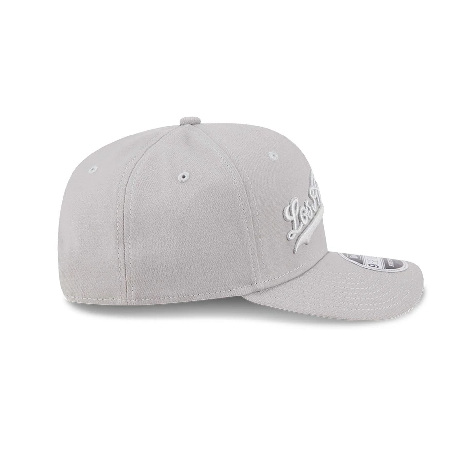 Pictured is this MLB Script LA Dodgers 9SEVENTY Stretch Snap cap in grey. 5