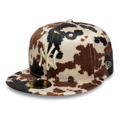 This is a New York Yankees Animal Print Cow Beige 59FIFTY Fitted Cap 1