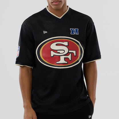 The model is wearing this NFL Mesh San Francisco 49ers Oversized T-Shirt in black. 4