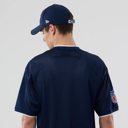 The model is wearing this NFL Mesh Seattle Seahawks Oversized T-Shirt in Navy. 7