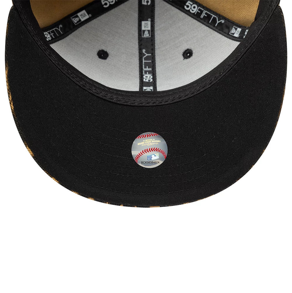 New York Yankees MLB Core Leopard Black New Era 59FIFTY Fitted Cap, inside view showing black taping with 59FIFTY branding, a grey sweatband, and a round baseball sticker placed on the black undervisor.