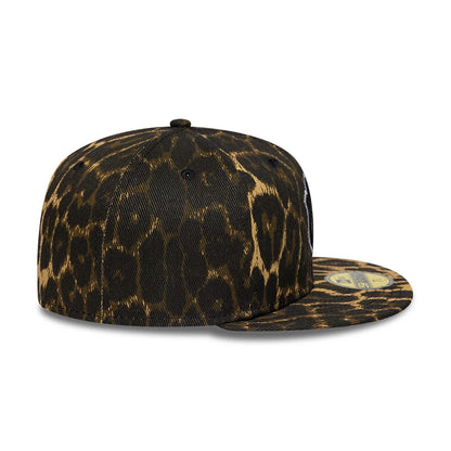 New York Yankees MLB Core Leopard Black New Era 59FIFTY Fitted Cap, side view with a leopard print pattern covering the structured crown and flat visor, featuring the gold 59FIFTY size sticker on the leopard-printed visor.