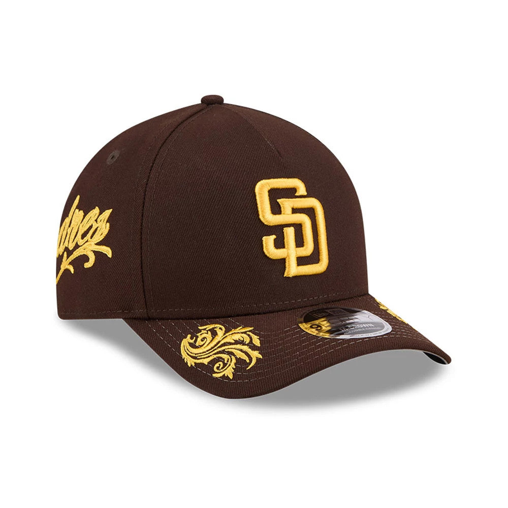 Pictured is this MLB Script San Diego Padres 9FORTY M-Crown A-Frame Adjustable cap in dark brown. 1