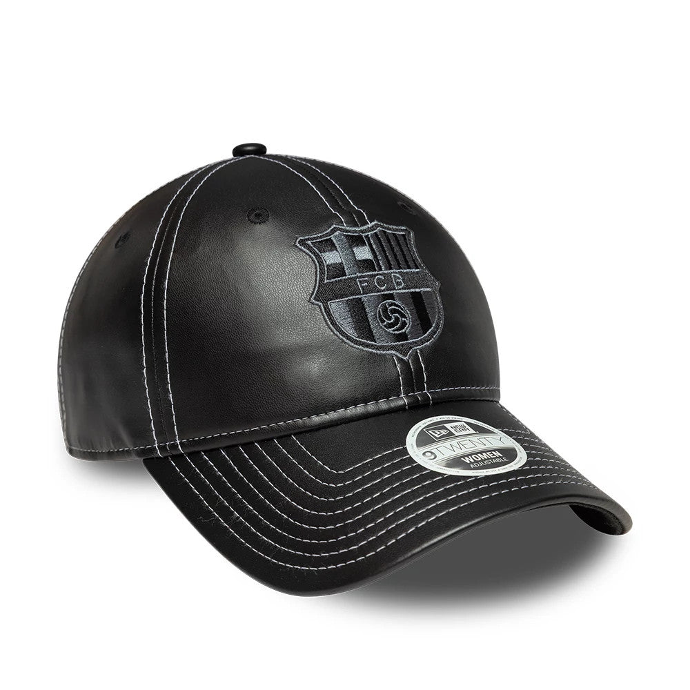 FC Barcelona Womens PU Black New Era 9TWENTY Adjustable Cap, three-quarter view showing the black embroidered FCB crest on the front panel, with a curved black visor featuring contrasting white stitching and a 9TWENTY size sticker.