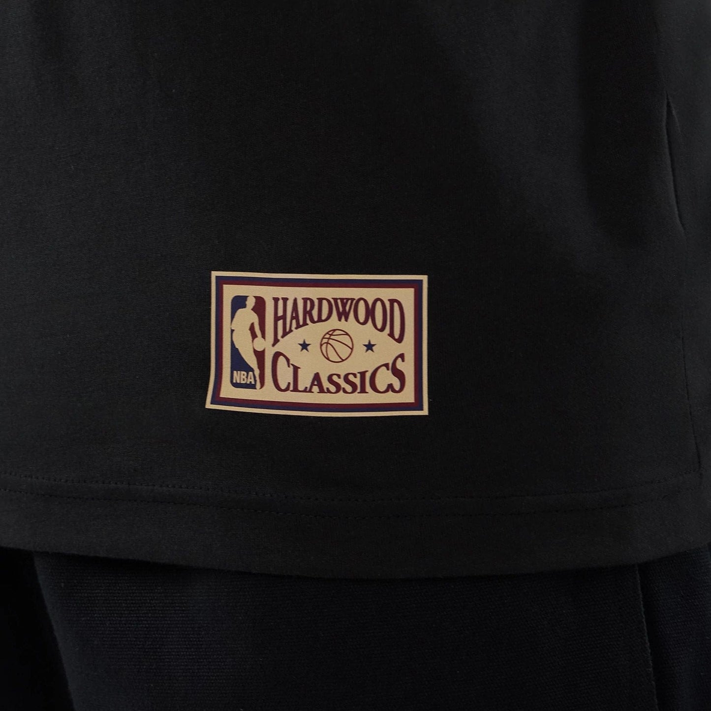 The model is wearing this NBA Hardwood Classic Phoenix Suns T-Shirt in black. 5