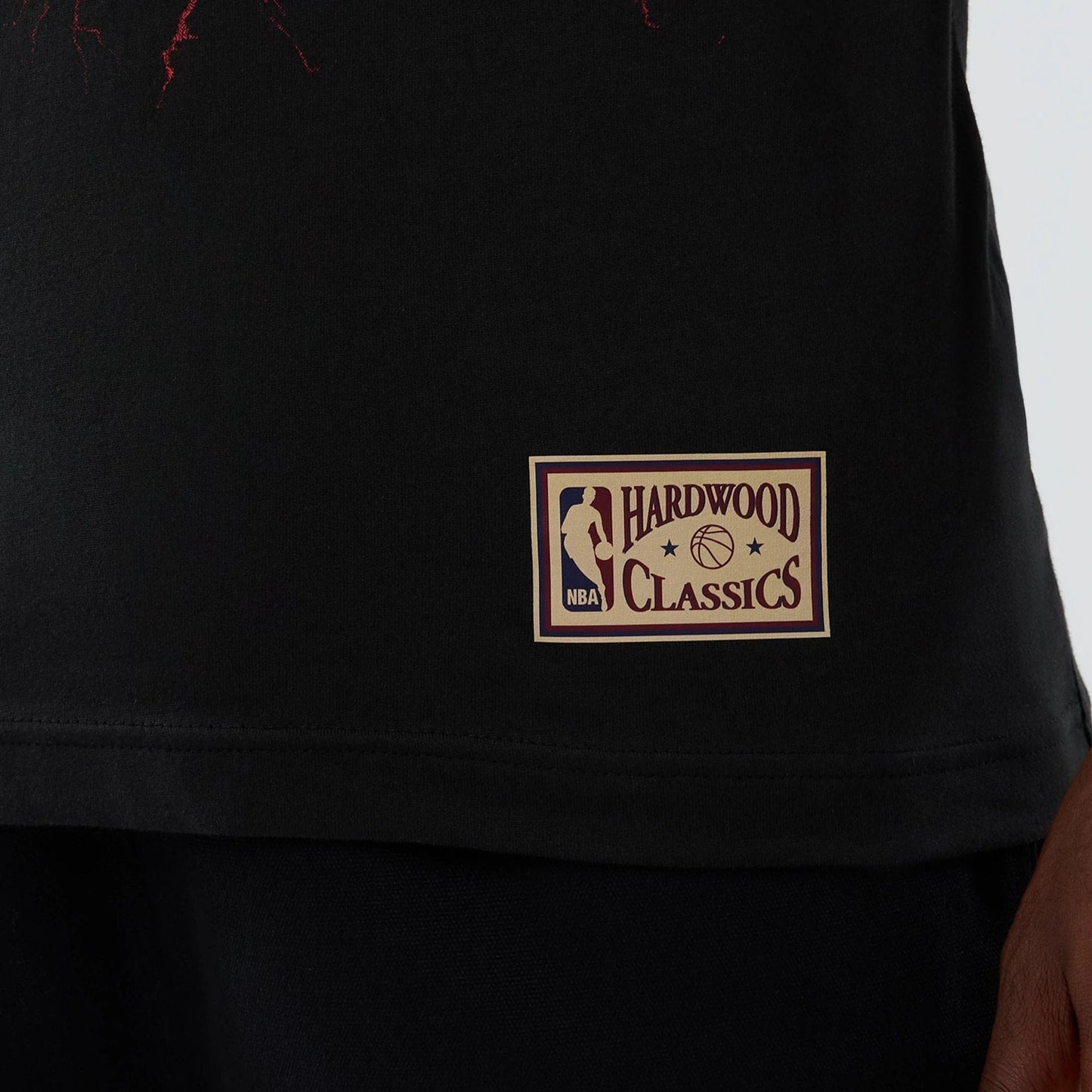 The model is wearing this NBA Hardwood Classic Toronto Raptors T-Shirt in black. 5