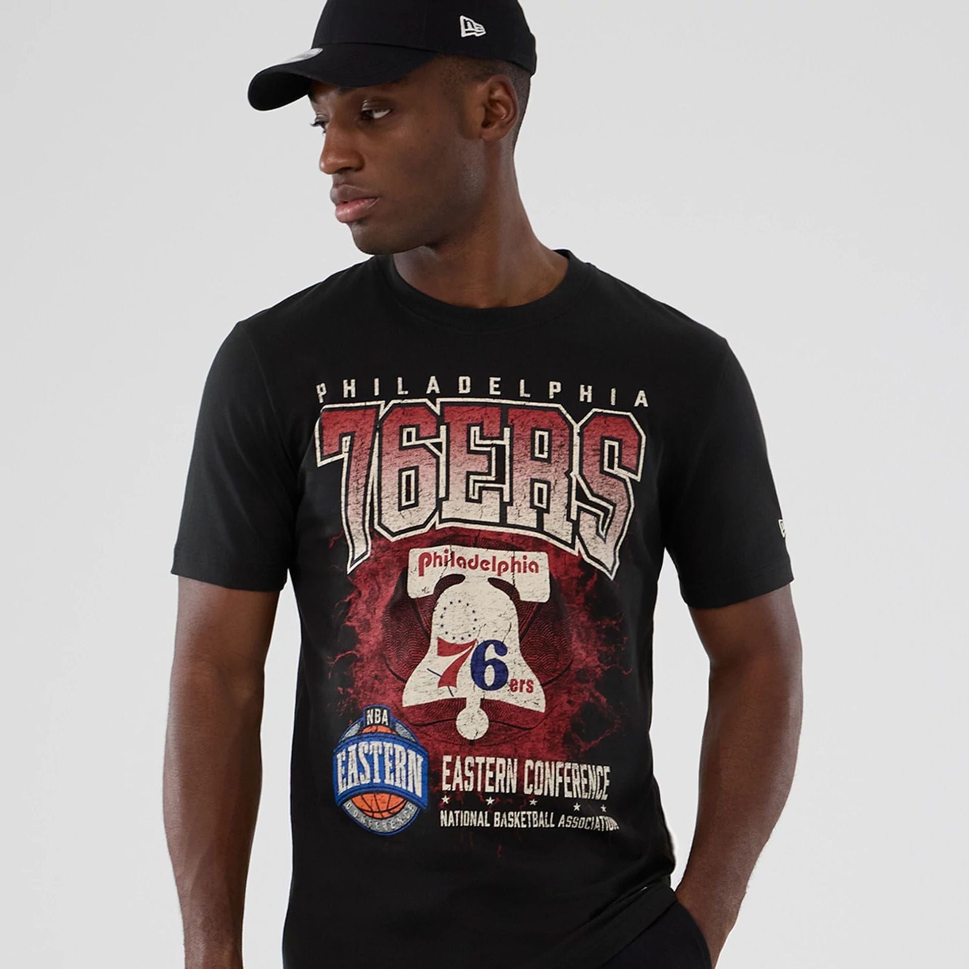 The model is wearing this NBA Hardwood Classic Philadelphia 76ers T-Shirt in black. 7