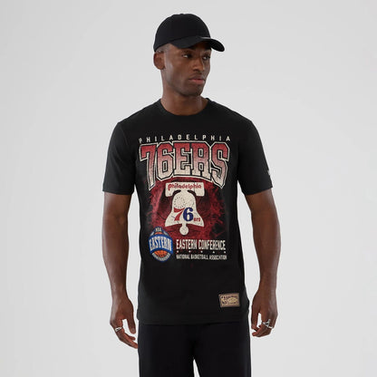 The model is wearing this NBA Hardwood Classic Philadelphia 76ers T-Shirt in black. 1