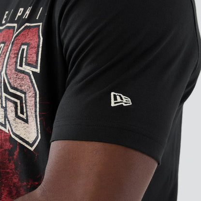 The model is wearing this NBA Hardwood Classic Philadelphia 76ers T-Shirt in black. 4