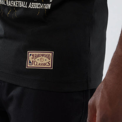 The model is wearing this NBA Hardwood Classic LA Lakers T-Shirt in black. 5