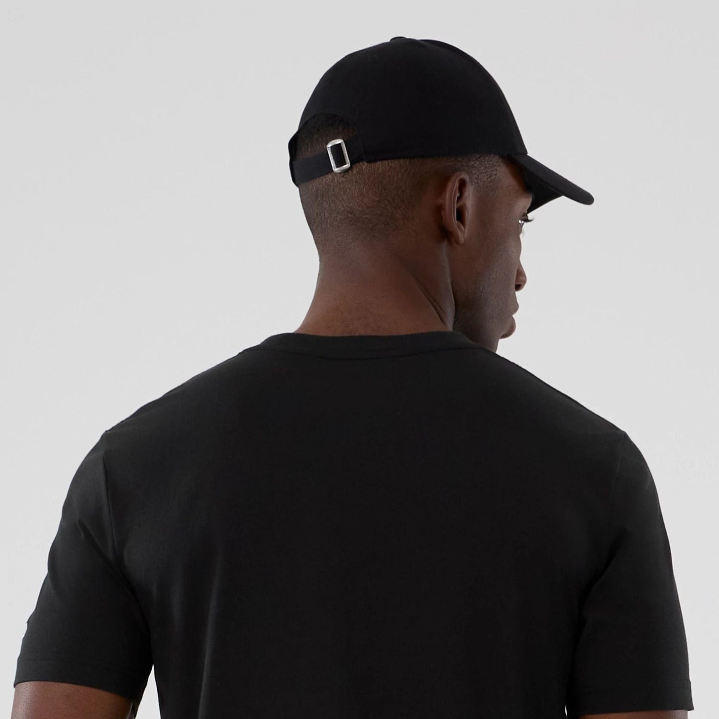 The model is wearing this NBA Hardwood Classic LA Lakers T-Shirt in black. 6