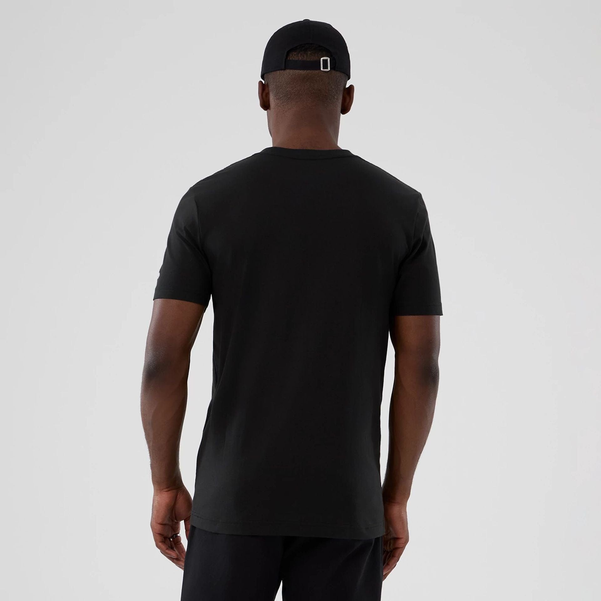 The model is wearing this NBA Hardwood Classic LA Lakers T-Shirt in black. 2