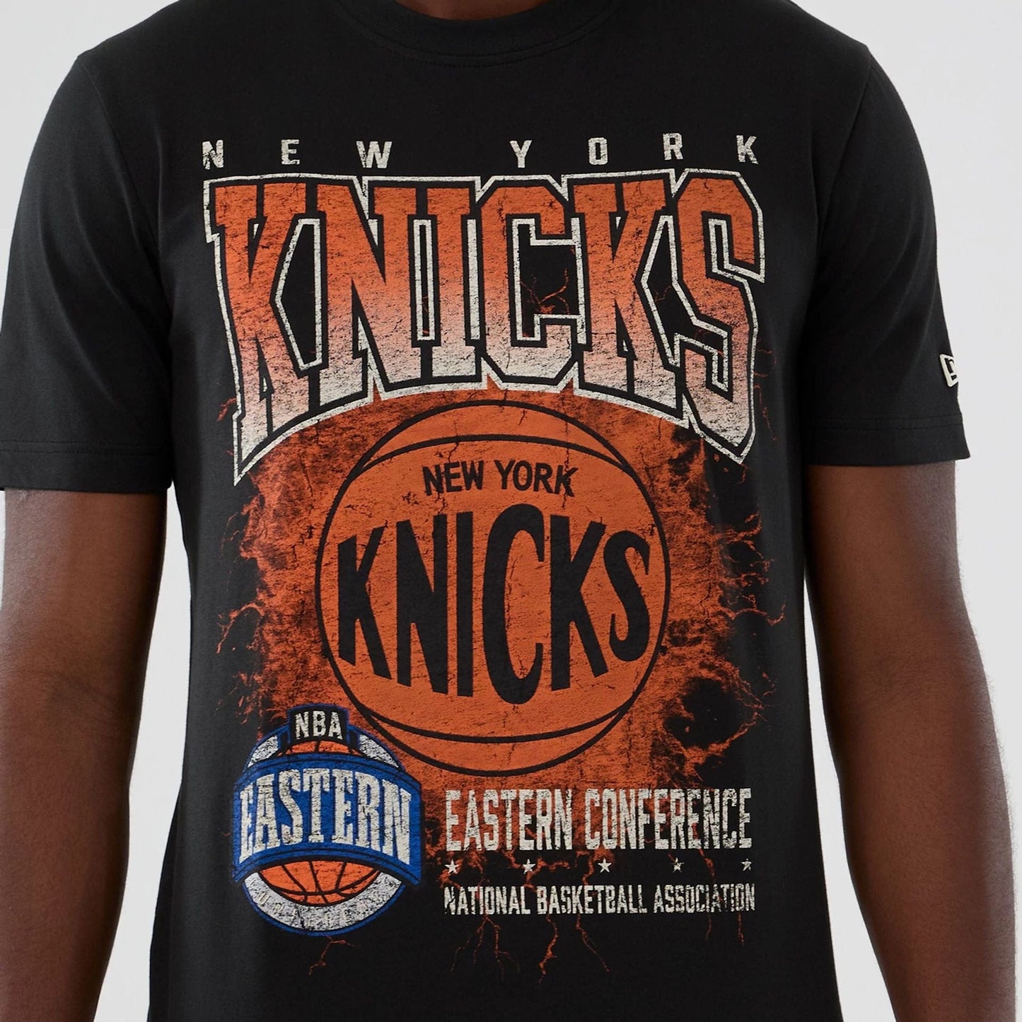 The model is wearing this NBA Hardwood Classic New York Knicks T-Shirt in black. 3