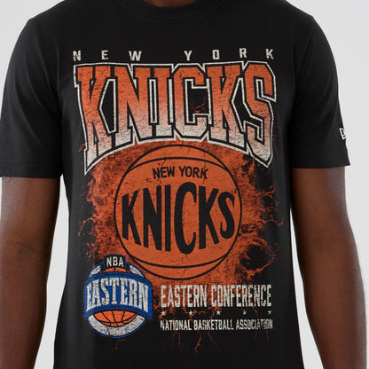 The model is wearing this NBA Hardwood Classic New York Knicks T-Shirt in black. 3