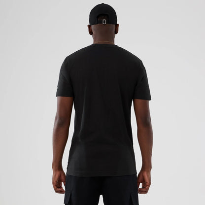 The model is wearing this NBA Hardwood Classic New York Knicks T-Shirt in black. 2