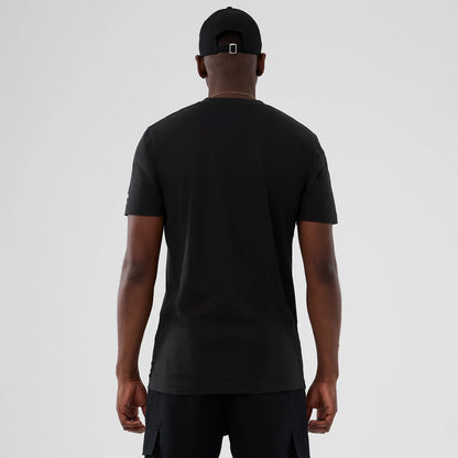 The model is wearing this NBA Hardwood Classic New York Knicks T-Shirt in black. 2